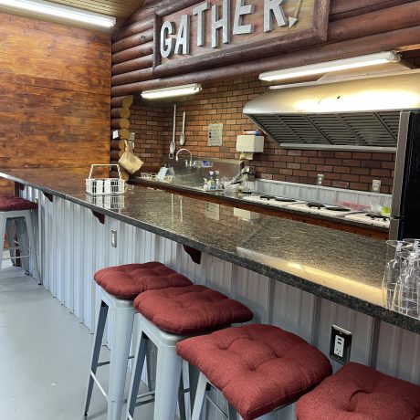 Image of bar stools in the kitchen area at Nugget RV Park