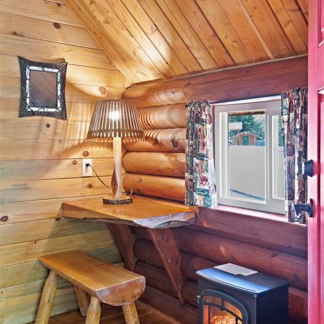 Image of cabin interior with the heater on at Nugget RV Park