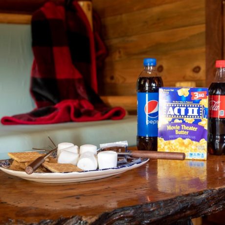 Image of cabin interior with snacks on the table at Nugget RV Park