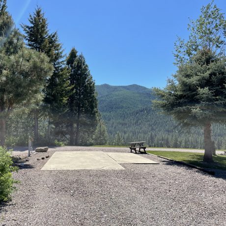 Image of recreational area with nearby trees and view of the hills at Nugget RV Park